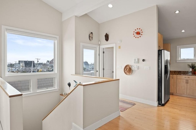 32 Northern Blvd, Newbury, MA 01951 - hall featuring lofted ceiling, baseboards, recessed lighting, light wood-style flooring, and an upstairs landing