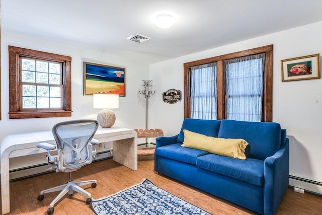 315 Pleasant St, Chatham, MA 02659 - office featuring baseboard heating and wood finished floors