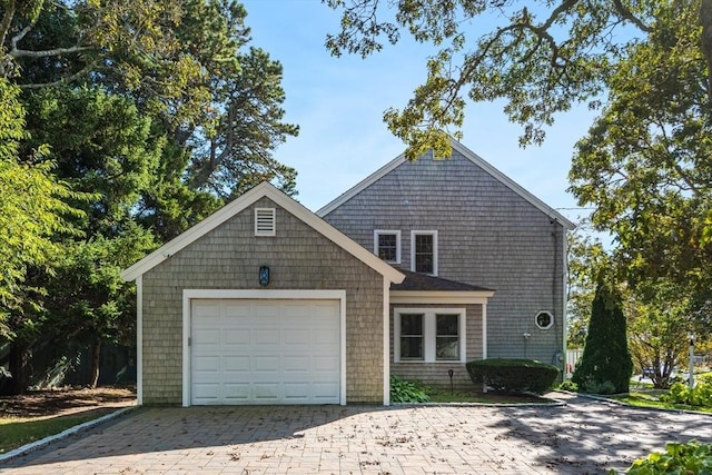 315 Pleasant St, Chatham, MA 02659 - view of front facade with a garage and decorative driveway