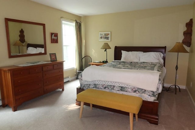 12 Sterling Ln Unit 12, Walpole, MA 02081 - carpeted bedroom featuring a baseboard heating unit and baseboards