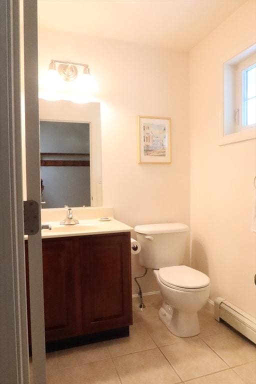 12 Sterling Ln Unit 12, Walpole, MA 02081 - bathroom with a baseboard radiator, toilet, tile patterned floors, vanity, and baseboards