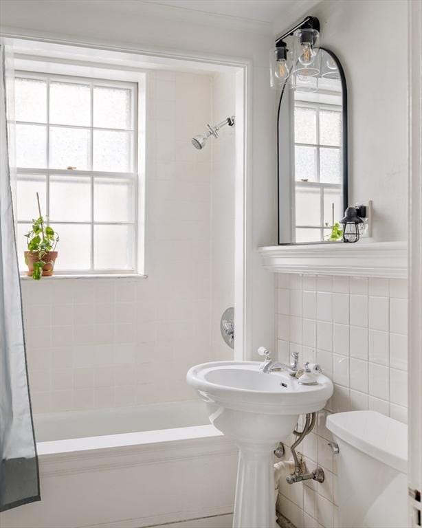 9 Ellery St Unit 33, Cambridge, MA 02138 - full bathroom featuring shower / tub combo, toilet, and tile walls