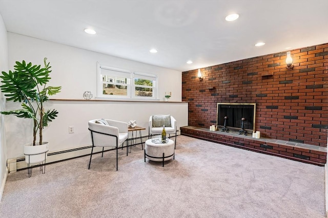 living room featuring recessed lighting, carpet, and a fireplace