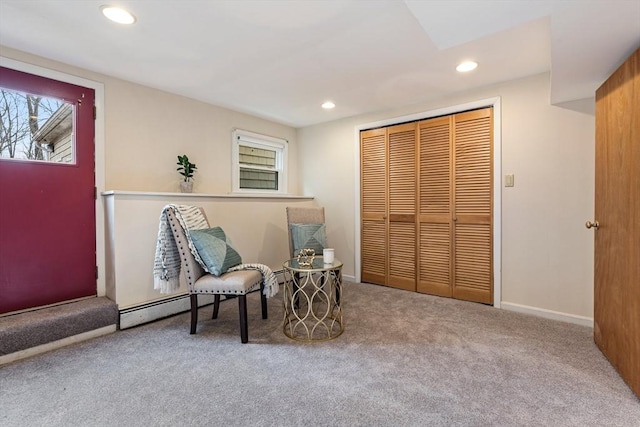 sitting room featuring carpet flooring, recessed lighting, baseboards, and a baseboard radiator