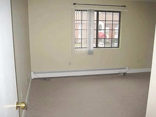 1610 Skyline Dr Unit 11, Lowell, MA 01854 - carpeted empty room featuring baseboards and baseboard heating