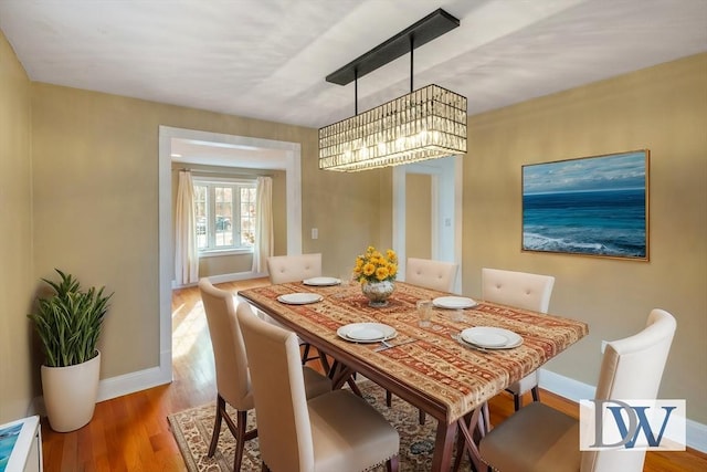 dining area featuring hardwood / wood-style floors