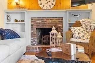 168 N Shore Blvd Unit 12, Sandwich, MA 02537 - interior space featuring a brick fireplace