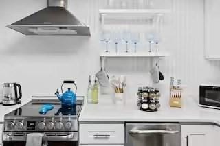 168 N Shore Blvd Unit 12, Sandwich, MA 02537 - interior space with appliances with stainless steel finishes and range hood
