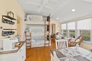 168 N Shore Blvd Unit 12, Sandwich, MA 02537 - dining area featuring recessed lighting, vaulted ceiling, and wood finished floors
