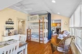 168 N Shore Blvd Unit 12, Sandwich, MA 02537 - interior space with vaulted ceiling, a wealth of natural light, and wood finished floors