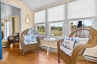 168 N Shore Blvd Unit 12, Sandwich, MA 02537 - sunroom / solarium featuring french doors and a baseboard radiator