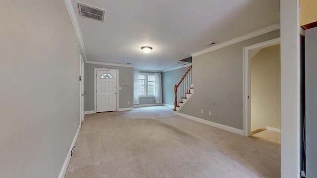 entryway with crown molding, light colored carpet, stairs, baseboards, and visible vents