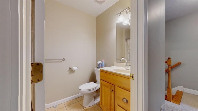 full bathroom with visible vents, baseboards, toilet, vanity, and tile patterned flooring