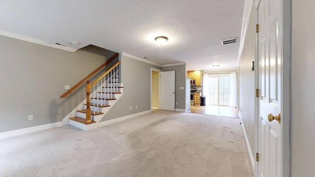 interior space featuring light carpet, crown molding, baseboards, and visible vents