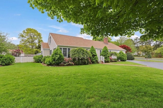 8 Viking Rock Rd, Yarmouth, MA 02664 - view of front facade with a chimney