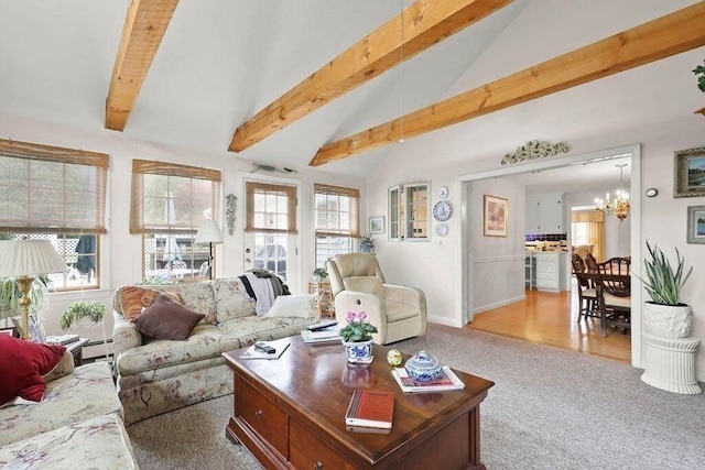 8 Viking Rock Rd, Yarmouth, MA 02664 - carpeted living room featuring a chandelier and a baseboard radiator