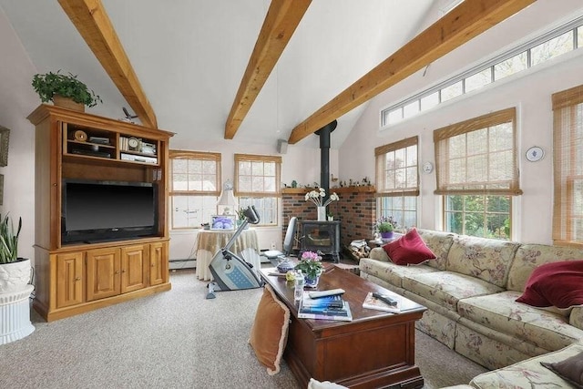8 Viking Rock Rd, Yarmouth, MA 02664 - living area with light carpet, beamed ceiling, a wood stove, plenty of natural light, and baseboard heating