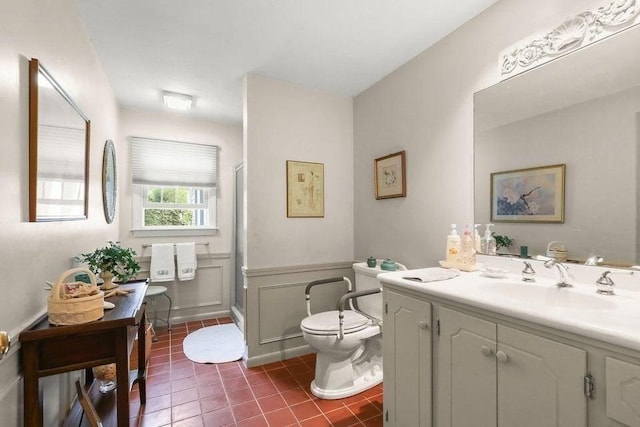 8 Viking Rock Rd, Yarmouth, MA 02664 - bathroom featuring vanity, tile patterned floors, an enclosed shower, and a wainscoted wall