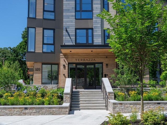 100 Linden St Unit 103, Wellesley, MA 02482 - entrance to property featuring french doors and brick siding