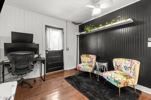 home office with baseboards, ceiling fan, and hardwood / wood-style flooring