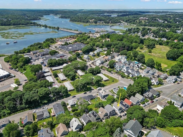 birds eye view of property featuring a residential view and a water view