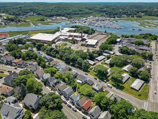 birds eye view of property featuring a water view