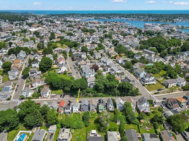 aerial view featuring a residential view and a water view