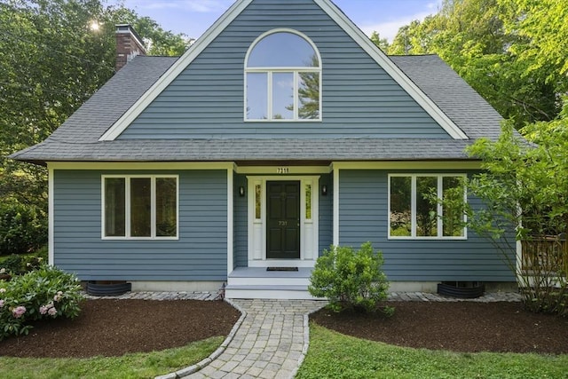 731-R Grove St, Norwell, MA 02061 - view of front facade with roof with shingles and a chimney