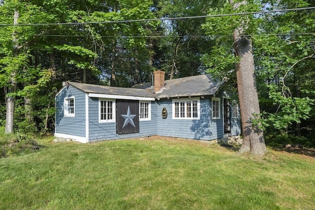 731-R Grove St, Norwell, MA 02061 - view of front facade featuring a chimney and a front yard