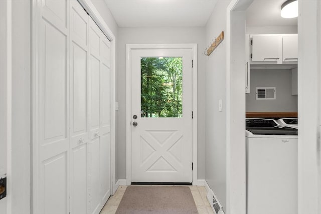 731-R Grove St, Norwell, MA 02061 - doorway with separate washer and dryer and baseboards