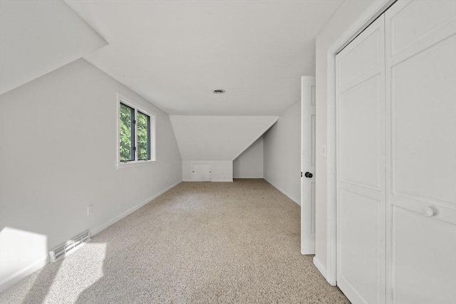 731-R Grove St, Norwell, MA 02061 - bonus room featuring light colored carpet and lofted ceiling