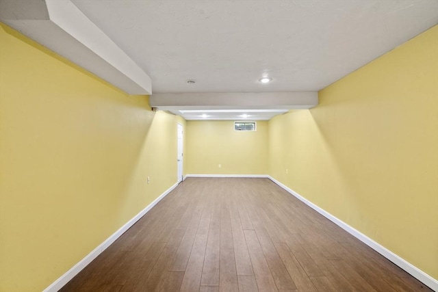731-R Grove St, Norwell, MA 02061 - below grade area featuring baseboards and wood finished floors