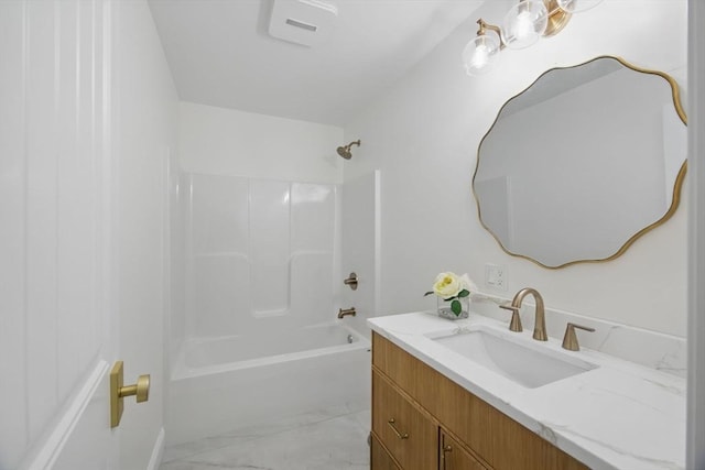 full bathroom with vanity,  shower combination, and marble finish floor