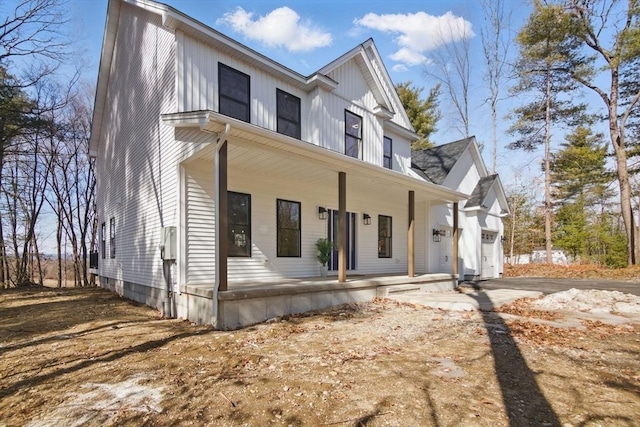 modern farmhouse with a porch