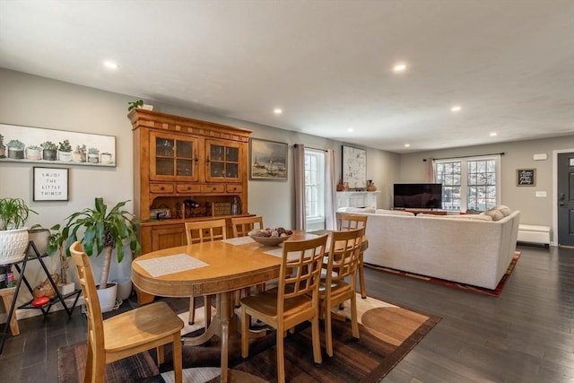 dining area with recessed lighting and dark wood-style flooring