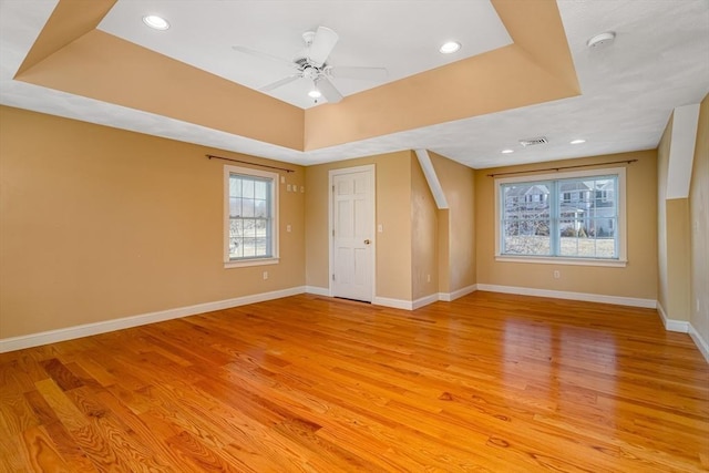 additional living space featuring light hardwood / wood-style flooring and ceiling fan