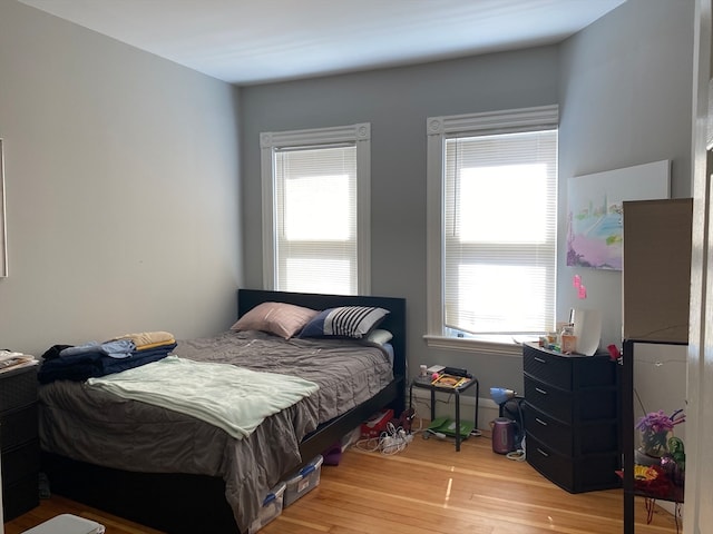 bedroom with light hardwood / wood-style floors