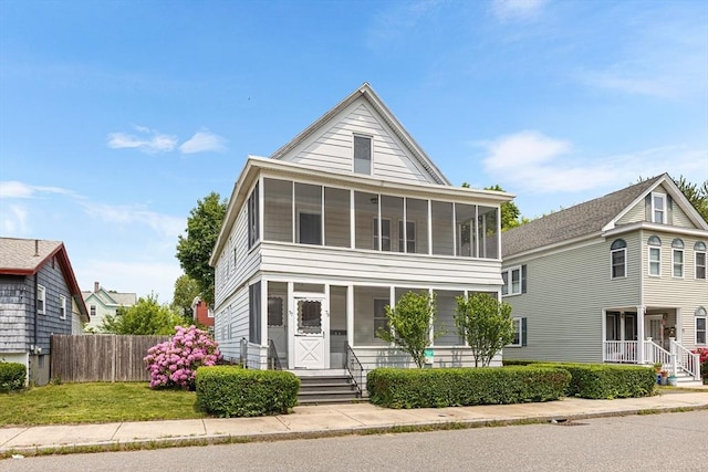 75 Norcross St, Lowell, MA 01851 - view of front of house featuring a sunroom