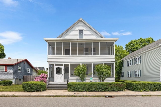 75 Norcross St, Lowell, MA 01851 - view of front facade featuring a sunroom