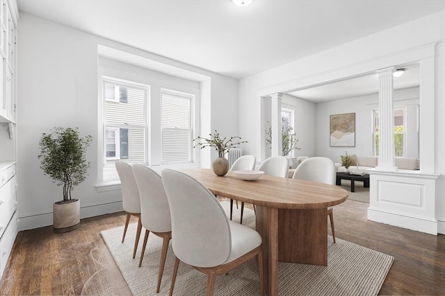75 Norcross St, Lowell, MA 01851 - dining room with ornate columns and dark wood finished floors