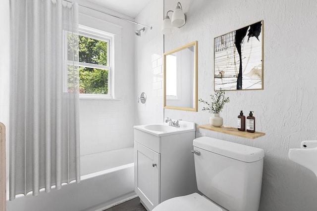 75 Norcross St, Lowell, MA 01851 - bathroom featuring shower / bath combo, vanity, and toilet