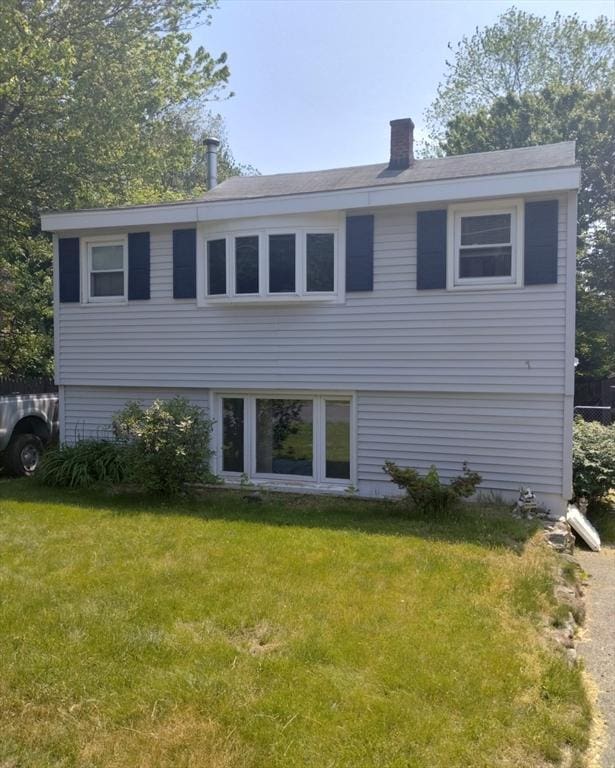 7 Pontos Ave, Burlington, MA 01803 - view of front facade featuring a front lawn and a chimney
