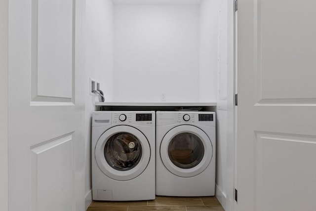 18-20 Parkman St Unit 1, Boston, MA 02122 - laundry room featuring washing machine and dryer and wood finished floors