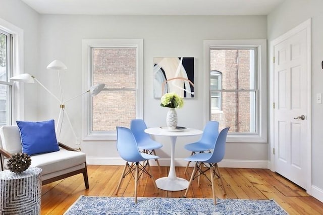 4 Perry St Unit 2, Brookline, MA 02445 - dining space with wood finished floors and baseboards
