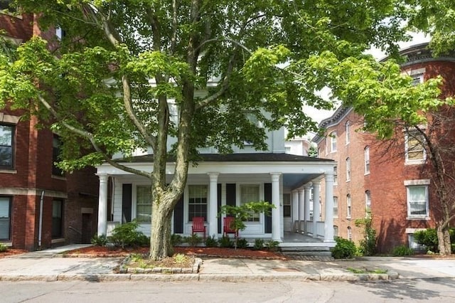 4 Perry St Unit 2, Brookline, MA 02445 - greek revival inspired property featuring a porch