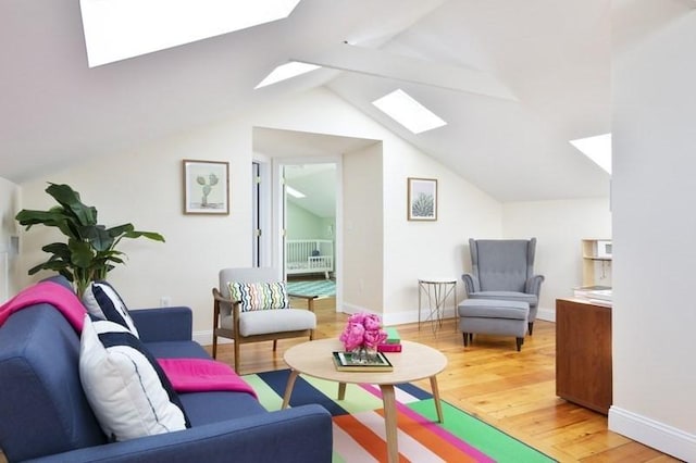 4 Perry St Unit 2, Brookline, MA 02445 - living area featuring a skylight and light wood-type flooring