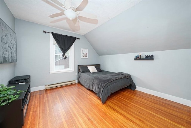 67 Pine St, Milford, MA 01757 - bedroom with a baseboard heating unit, light wood-type flooring, lofted ceiling, a ceiling fan, and baseboards