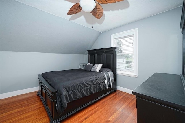 67 Pine St, Milford, MA 01757 - bedroom featuring baseboards, wood finished floors, vaulted ceiling, and a ceiling fan