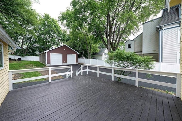 67 Pine St, Milford, MA 01757 - wooden deck with a detached garage and an outdoor structure