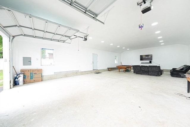 67 Pine St, Milford, MA 01757 - garage featuring a garage door opener, electric panel, and recessed lighting
